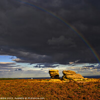 Buy canvas prints of The Ox Stones caught in storm light. by Chris Drabble