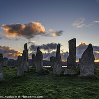 Buy canvas prints of Calanais Standing Stones at sunset by Chris Drabble