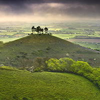 Buy canvas prints of Colmers Hill at dawn on a dark and gloomy morning  by Chris Drabble