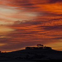 Buy canvas prints of Minninglow with light from the rising sun by Chris Drabble