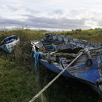 Buy canvas prints of Abandoned boats in Cove Harbour by Chris Drabble