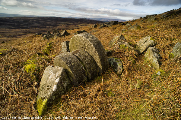 Abandoned Mill Stones under Stanage Edge. Picture Board by Chris Drabble