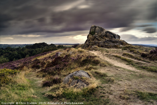 Ashover Stone and moving clouds Picture Board by Chris Drabble