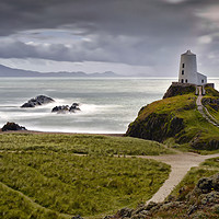 Buy canvas prints of Twr Mawr Lighthouse, caught in sunlight.           by Chris Drabble