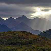 Buy canvas prints of Crepuscular light rays over the Five Sisters by Chris Drabble