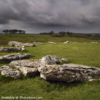 Buy canvas prints of A storm brewing over Arbor Low by Chris Drabble