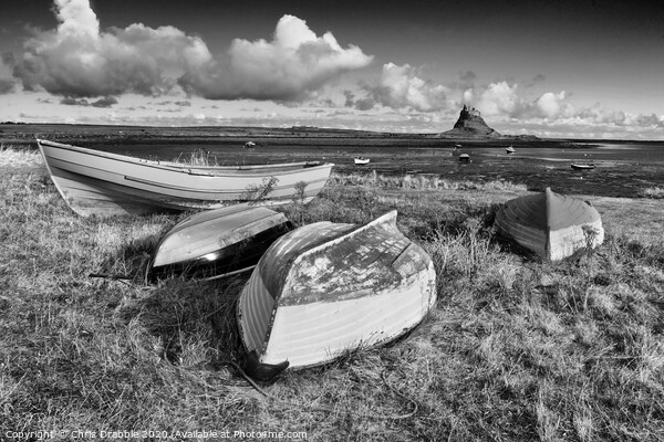 Boats at Lindisfarne in mono Picture Board by Chris Drabble