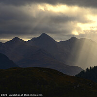 Buy canvas prints of The Five Sisters of Kintail illuminated in light r by Chris Drabble
