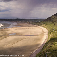 Buy canvas prints of Rossili Bay with rain moving through. by Chris Drabble