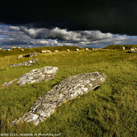 Buy canvas prints of Arbor Low with rain clouds moving throught by Chris Drabble
