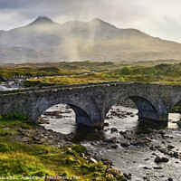 Buy canvas prints of The old Bridge at Sligachan in a rain storm by Chris Drabble