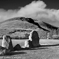 Buy canvas prints of Castlerigg Stone Circle and Blencathra in mono by Chris Drabble