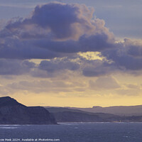 Buy canvas prints of Fiery Storm Clouds at Sunrise over the Jurassic Coast by Susie Peek
