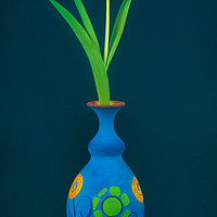 Buy canvas prints of Tulip in Blue Vase by Andrew Stevens