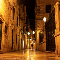 Buy canvas prints of Night view of a narrow street in the historical center of Dubrovnik, Croatia by Sergey Fedoskin