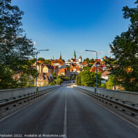 Buy canvas prints of Bridge over the river Luznice and the city of Tabor in the background. Czechia by Sergey Fedoskin