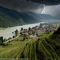Buy canvas prints of Thunderstorm with lightning over Weissenkirchen village. by Sergey Fedoskin
