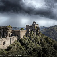 Buy canvas prints of Thunderstorm with lightning over Aggstein castle.  by Sergey Fedoskin