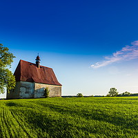 Buy canvas prints of Old church in the summer field. Dobronice u Bechyn by Sergey Fedoskin