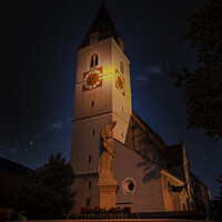 Buy canvas prints of A clock tower lit up at night. Spitz village. Wachau valley. Austria. by Sergey Fedoskin