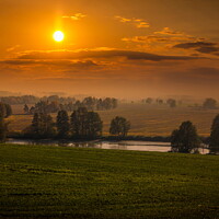 Buy canvas prints of Sunset over field and forest. by Sergey Fedoskin