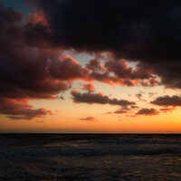 Buy canvas prints of Cloudy sunset at the stormy sea. by Sergey Fedoskin