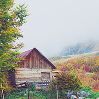 Buy canvas prints of Mountains in autumn. Abandoned warehouse. by Tartalja 