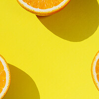 Buy canvas prints of Oranges on yellow background by Tartalja 