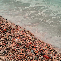 Buy canvas prints of sea waves lapping on the beach of pebbles. by Andrey Lipinskiy