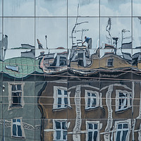 Buy canvas prints of Building reflection on Ghetto Heroes Square by Andrei Bortnikau