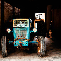 Buy canvas prints of Greek tractor in the garage, Halkidiki by Andrei Bortnikau