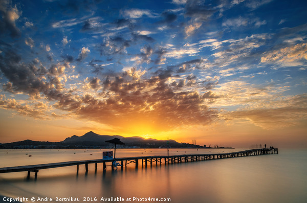 Puerto de Alcudia beach pier at sunrise in Mallorc Picture Board by Andrei Bortnikau