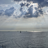 Buy canvas prints of  Sun-rays on the Solent. by Angela Aird