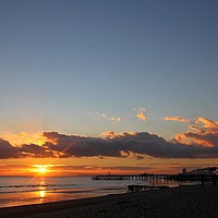 Buy canvas prints of Sunset at Hastings Beach by Jason Stubbs