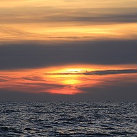 Buy canvas prints of Sunset at Sea by Jason Stubbs
