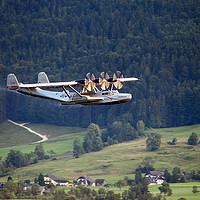 Buy canvas prints of Flying In The Alps by Rick Penrose