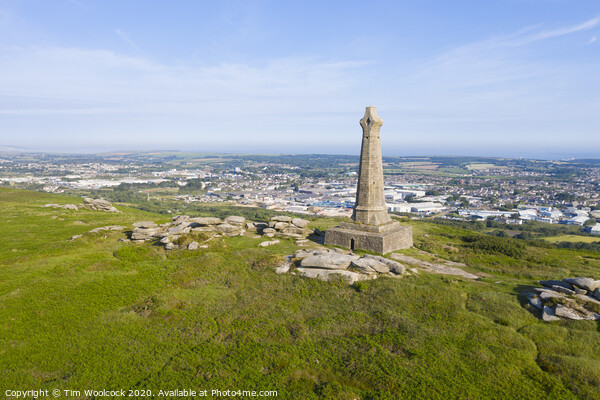 Aerial photograph of Carn Brea Monument, Redruth, Cornwall Picture Board by Tim Woolcock
