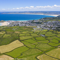 Buy canvas prints of Aerial photograph of St Ives taken towards Hayle by Tim Woolcock