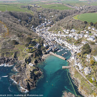Buy canvas prints of Aerial photograph of Polperro, Cornwall, England. by Tim Woolcock