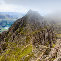 Buy canvas prints of Pinnacles of Liathach: A Hiker's Dream by Mark Greenwood