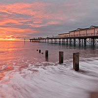 Buy canvas prints of Teignmouth Pier Sunrise by Bruce Little