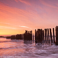 Buy canvas prints of Fiery Sunrise at the Old Groyne Dawlish Warren by Bruce Little