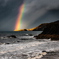 Buy canvas prints of Rainbow light on headland at Cardigan Bay by Joy Newbould