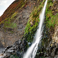 Buy canvas prints of Gwalia Waterfall, Tresaith Beach, Wales by Joy Newbould