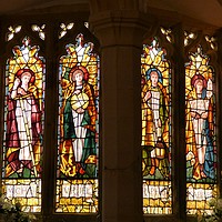 Buy canvas prints of The Archangel Window, St Mary's, Morthoe, North De by Paul Trembling