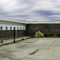 Buy canvas prints of Robben Island Prison Courtyard by Karl Daniels