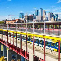 Buy canvas prints of Green Line light rail in Minneapolis by Jim Hughes