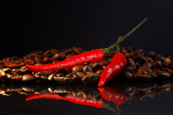 Black coffee and red chili in contrast  Picture Board by Tanja Riedel