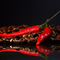 Buy canvas prints of Black coffee and red chili in contrast  by Tanja Riedel