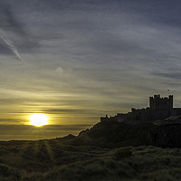 Buy canvas prints of Sunset Bamburgh Castle by Tony Bishop